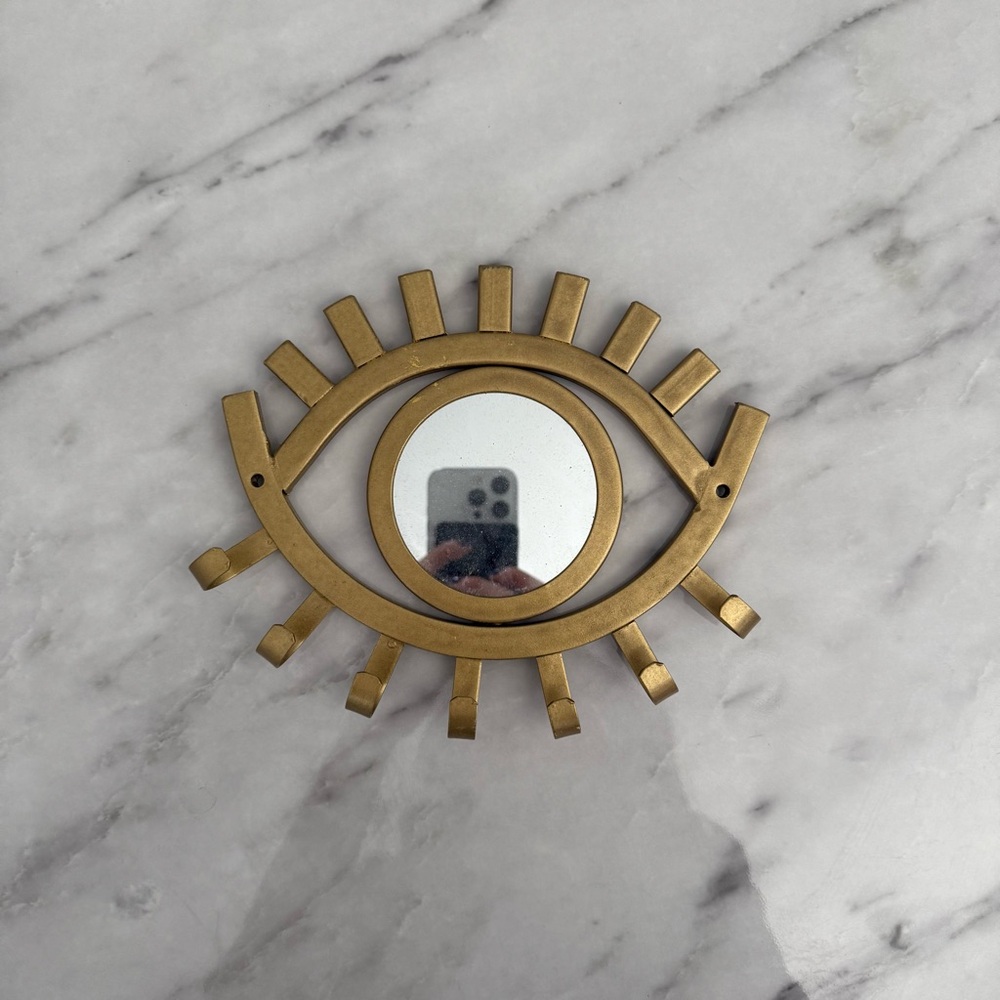 Gold Eye-Shaped Wall Mirror
